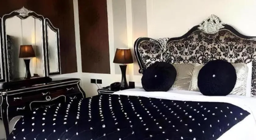 Bed in Alvarez Hotel