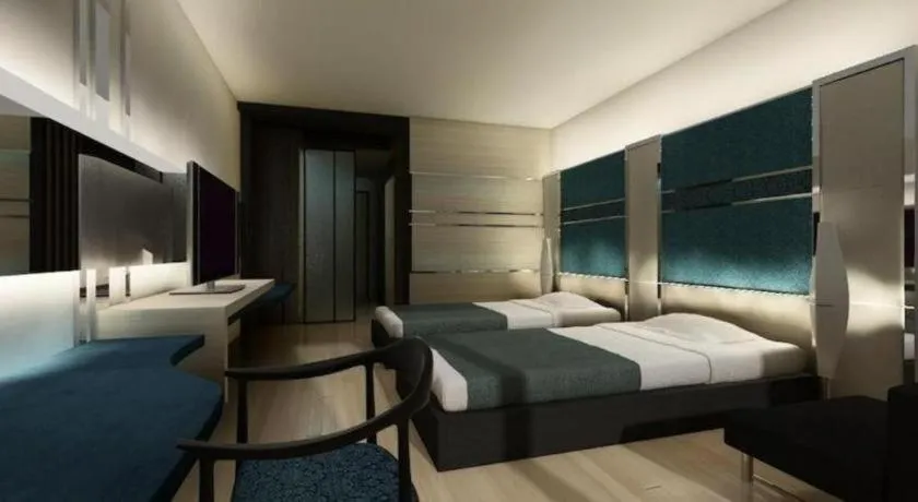 Bed in Alvarez Hotel