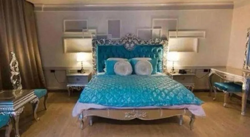 Bed in Alvarez Hotel