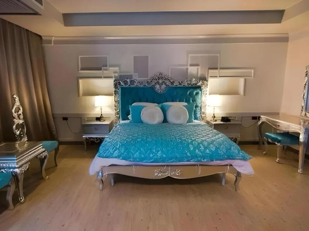 Bed in Alvarez Hotel