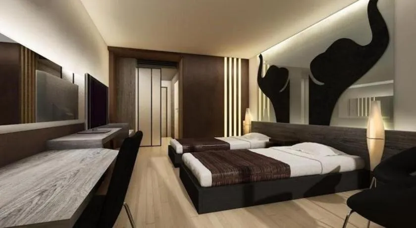 Bed in Alvarez Hotel