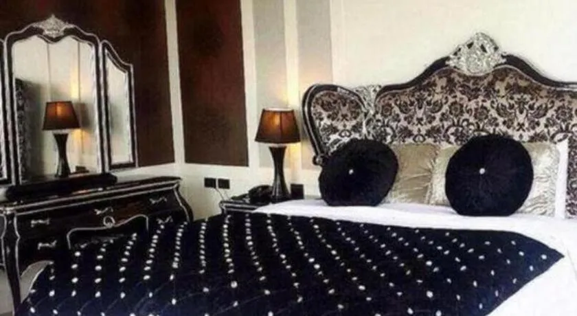 Bed in Alvarez Hotel