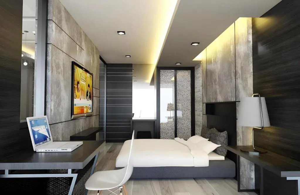 Bed in Alvarez Hotel