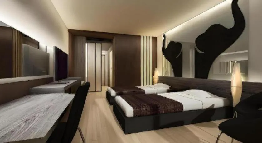 Bed in Alvarez Hotel