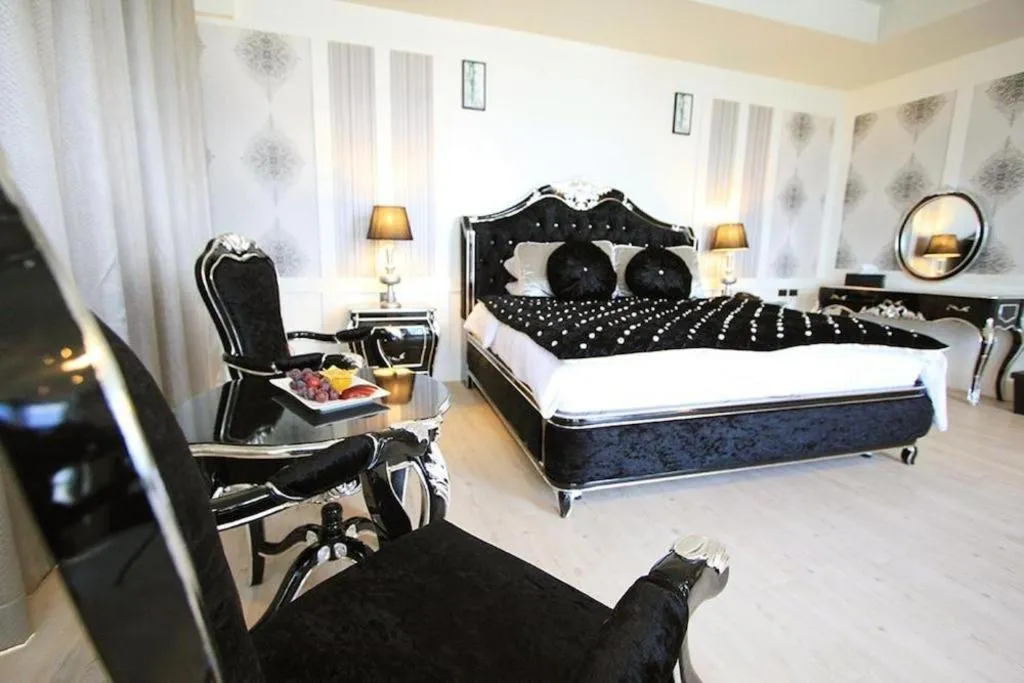 Bed in Alvarez Hotel