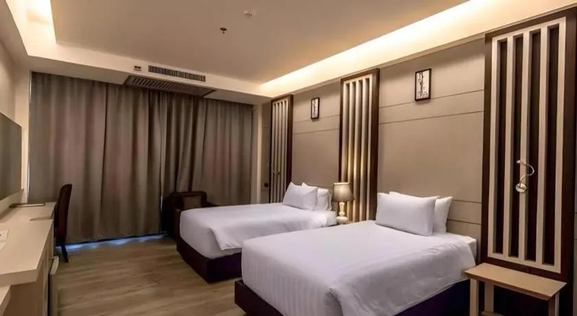 Bed in Alvarez Hotel