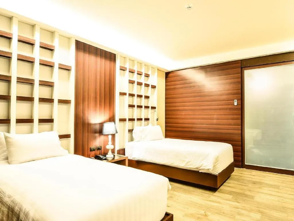 Bed in Alvarez Hotel