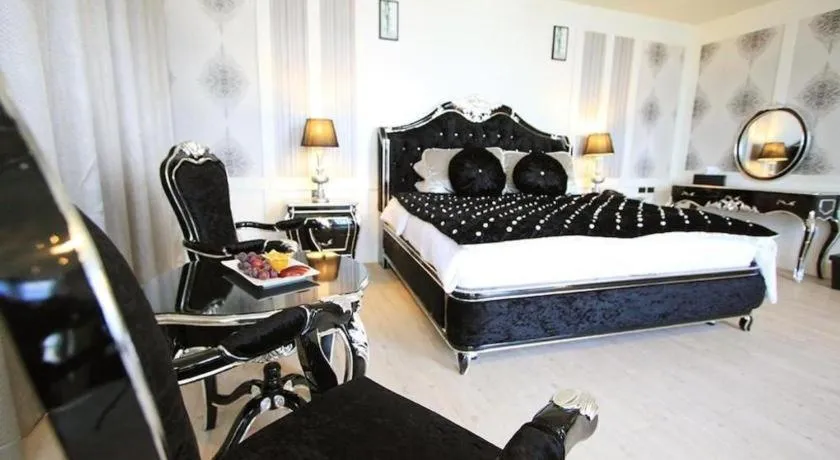 Bed in Alvarez Hotel