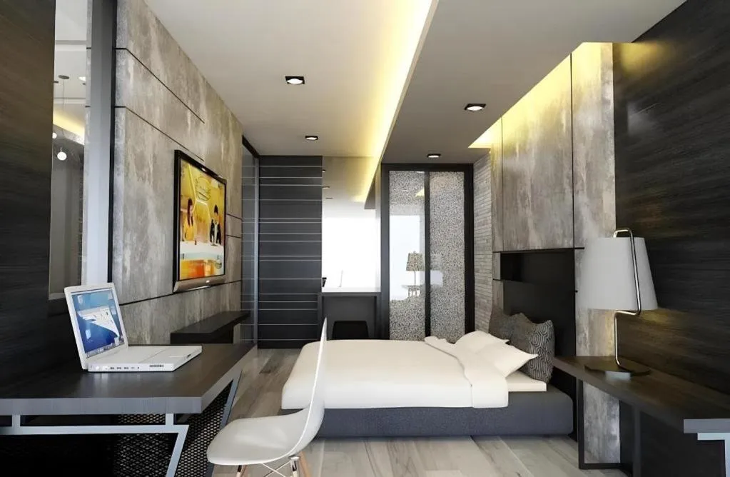 Bed in Alvarez Hotel