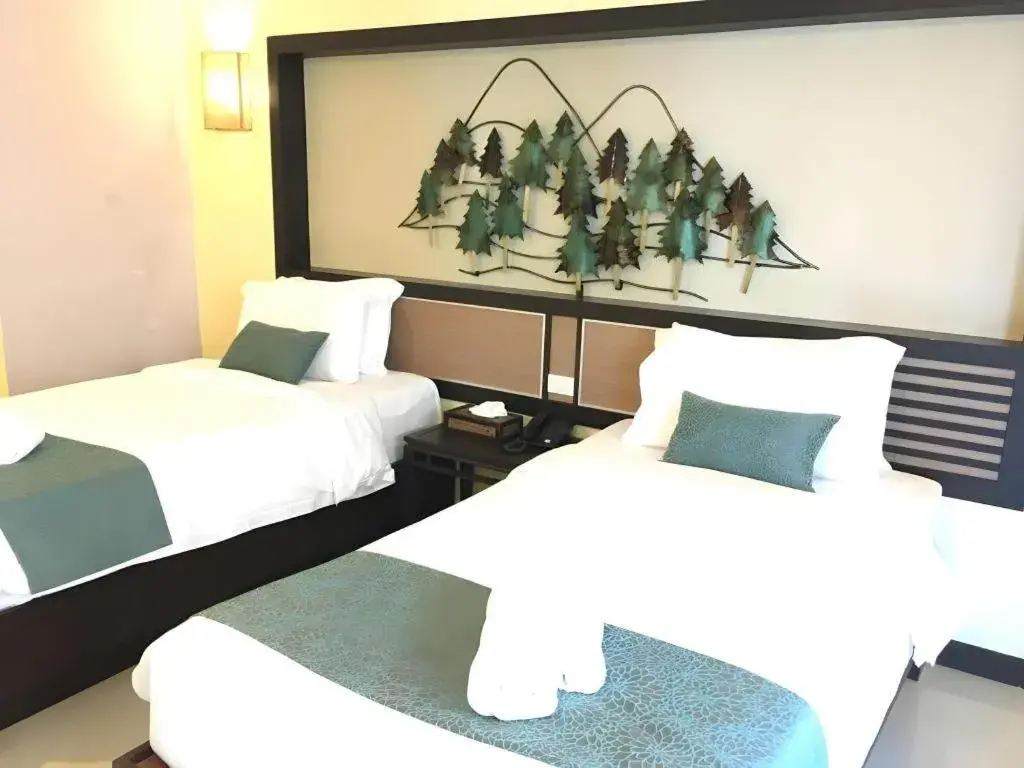 Bed in iL Mare Resort Bed in iL Mare Resort