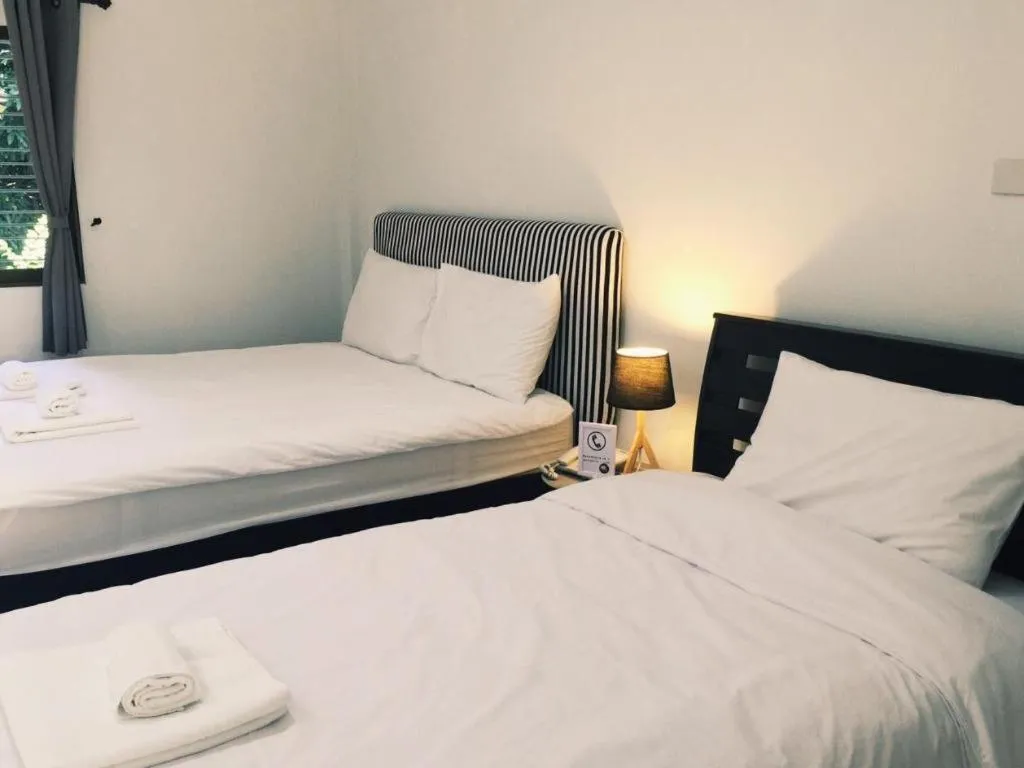 Bed in Maalamaii Hotel