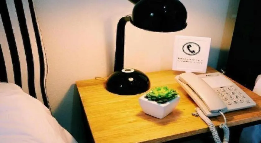 Bed in Maalamaii Hotel