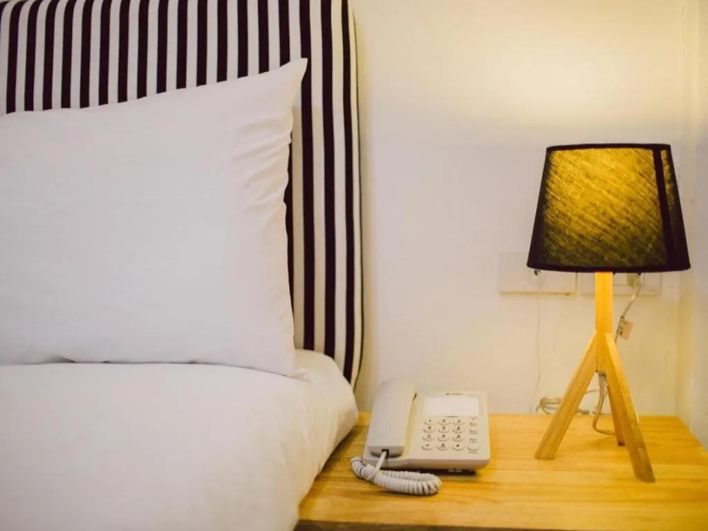 Bed in Maalamaii Hotel