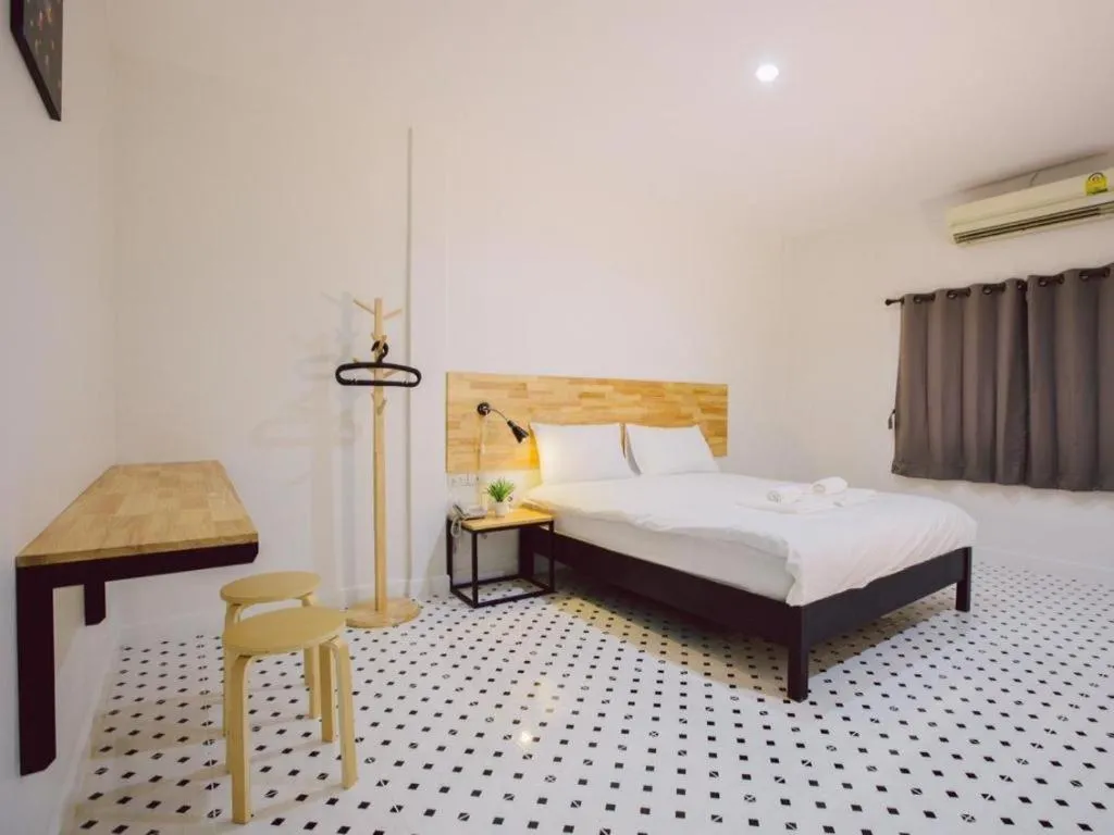 Bed in Maalamaii Hotel