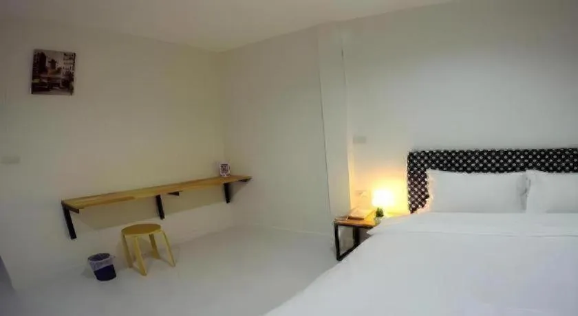 Bed in Maalamaii Hotel