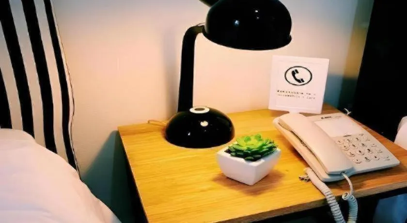 Bed in Maalamaii Hotel