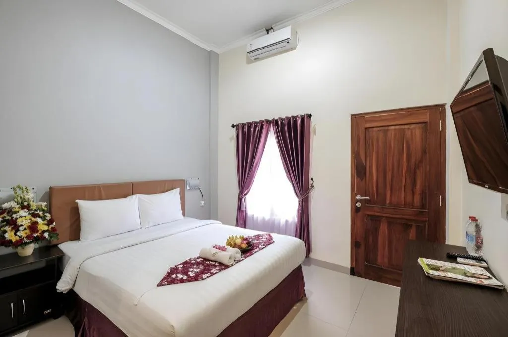 Bed in Malioboro Garden Hotel Yogyakarta