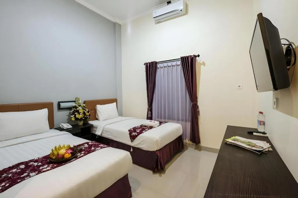 Bed in Malioboro Garden Hotel Yogyakarta