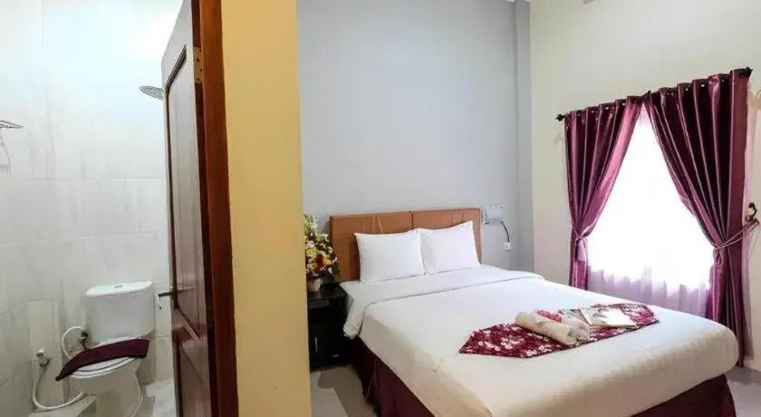 Bed in Malioboro Garden Hotel Yogyakarta Bed in Malioboro Garden Hotel Yogyakarta