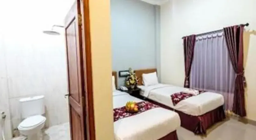 Bed in Malioboro Garden Hotel Yogyakarta Bed in Malioboro Garden Hotel Yogyakarta