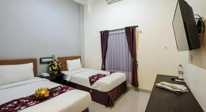 Bed in Malioboro Garden Hotel Yogyakarta Bed in Malioboro Garden Hotel Yogyakarta