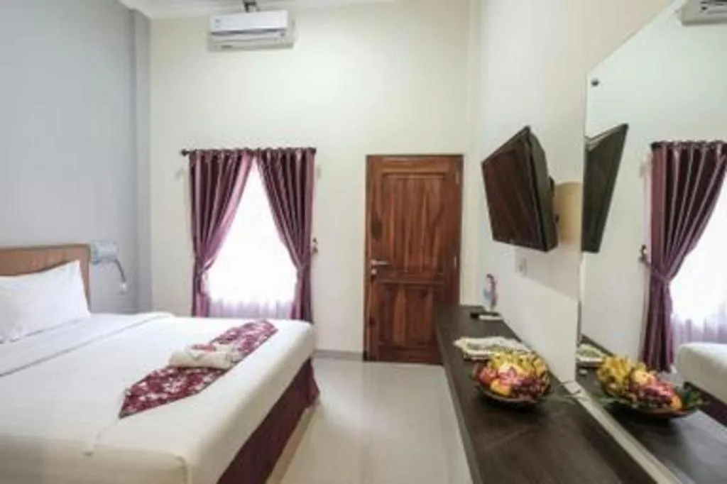 Bed in Malioboro Garden Hotel Yogyakarta