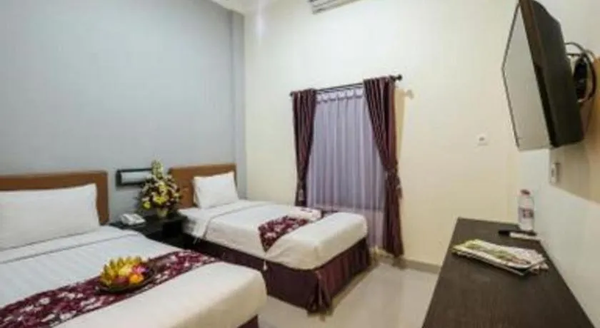 Bed in Malioboro Garden Hotel Yogyakarta