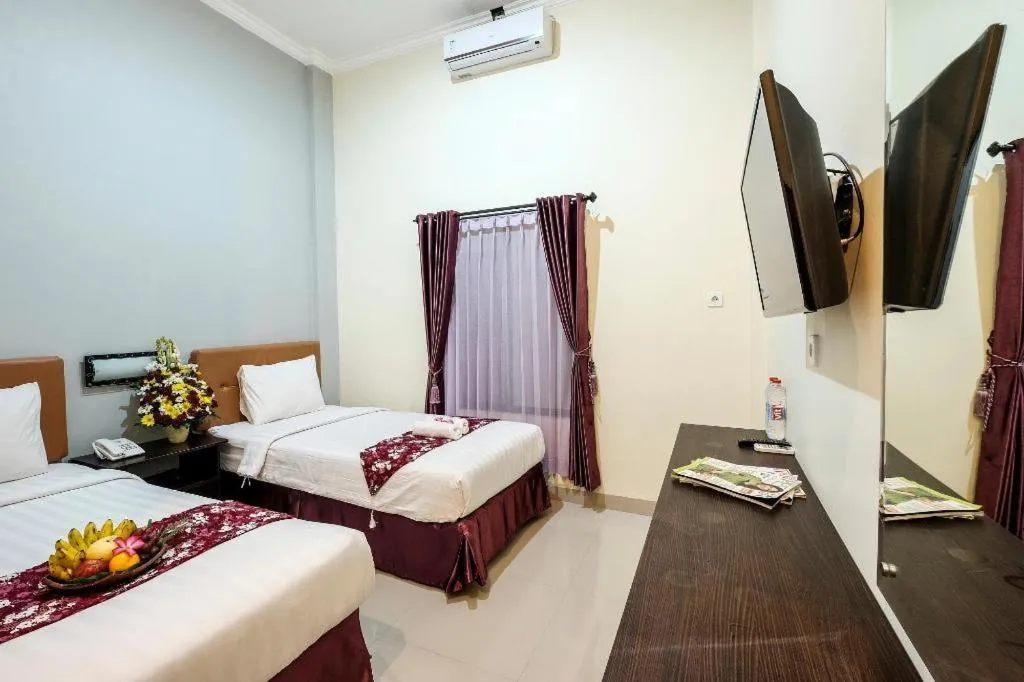 Bed in Malioboro Garden Hotel Yogyakarta