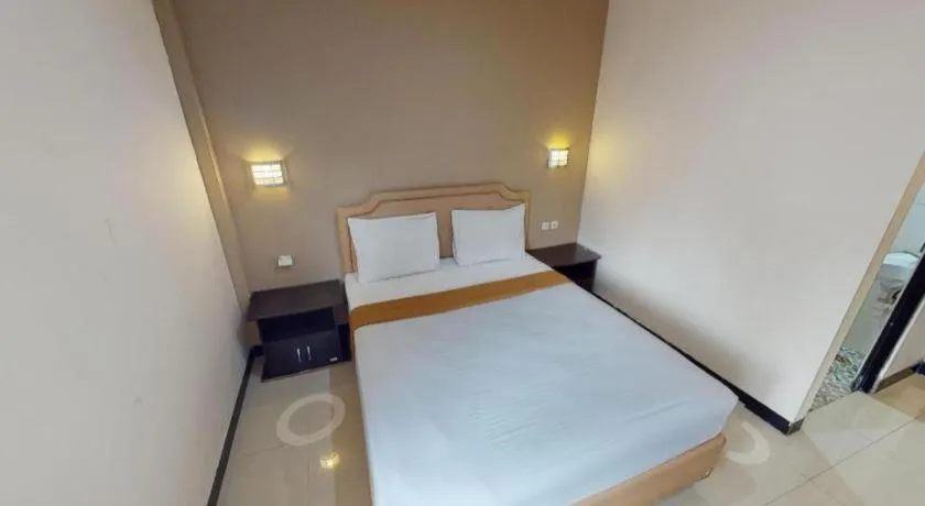 Bed in Malioboro Garden Hotel Yogyakarta