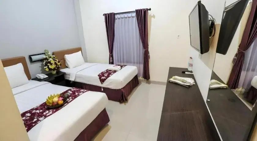 Bed in Malioboro Garden Hotel Yogyakarta Bed in Malioboro Garden Hotel Yogyakarta