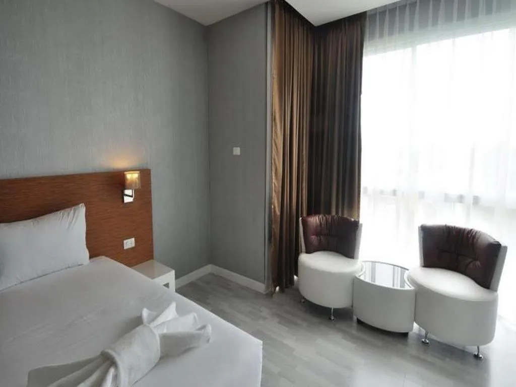 Bed in Tanzeno Hotel