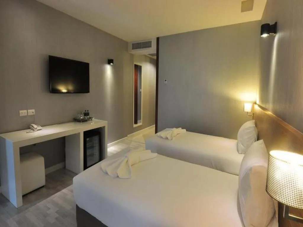 Bed in Tanzeno Hotel