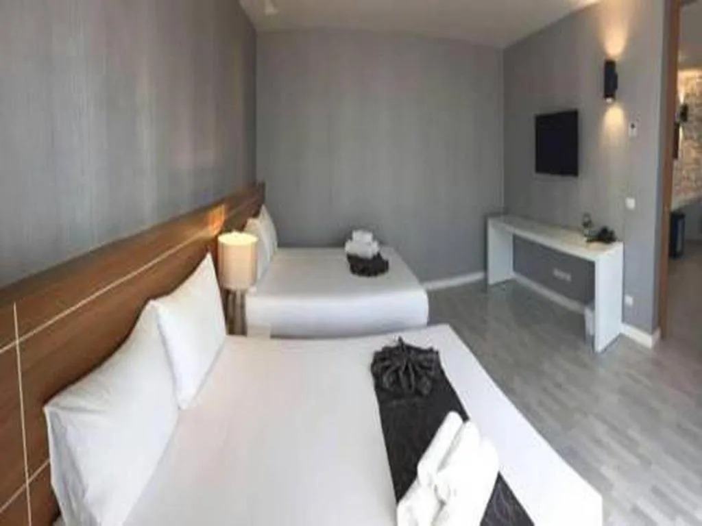 Bed in Tanzeno Hotel