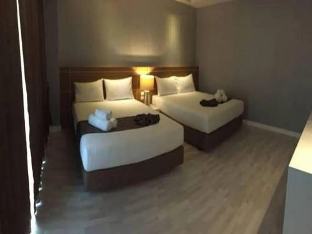 Bed in Tanzeno Hotel