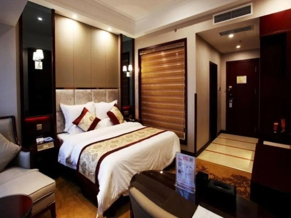 Bed in GreenTree Eastern Zigong Huashang International City Huichuan Road Hotel