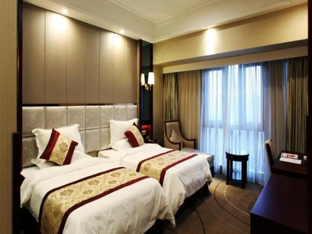 Bed in GreenTree Eastern Zigong Huashang International City Huichuan Road Hotel
