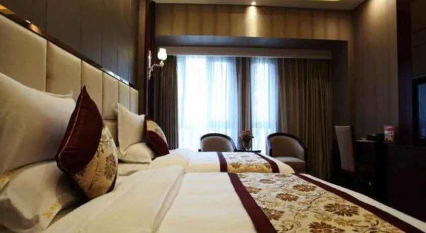 Bed in GreenTree Eastern Zigong Huashang International City Huichuan Road Hotel