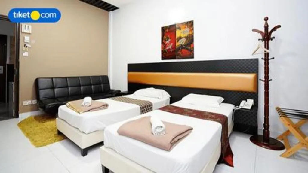 Bed in Lai Ming Hotel Cosmoland