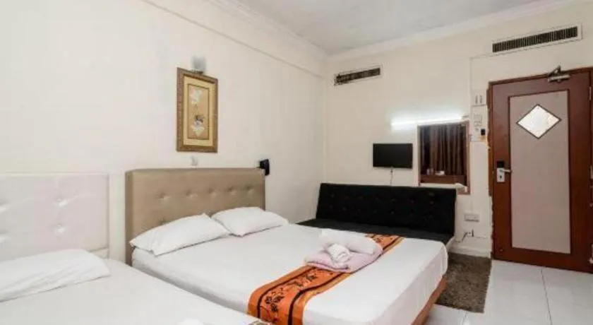 Bed in Lai Ming Hotel Cosmoland