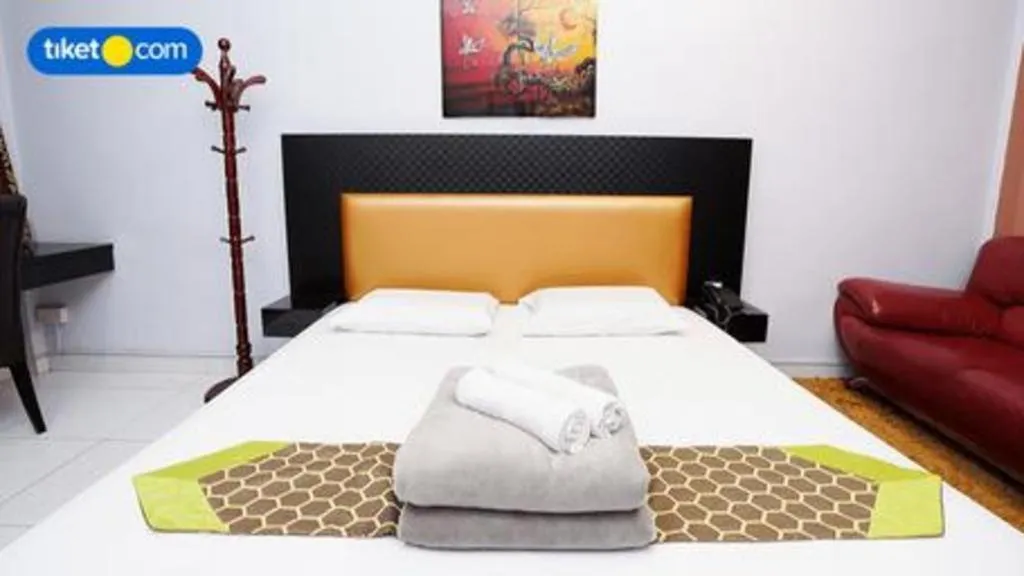 Bed in Lai Ming Hotel Cosmoland