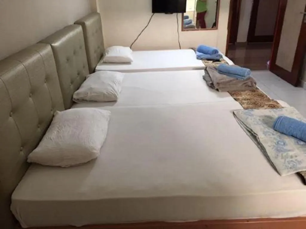 Bed in Lai Ming Hotel Cosmoland
