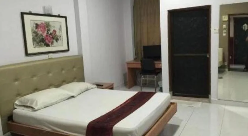 Bed in Lai Ming Hotel Cosmoland