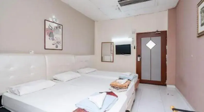 Bed in Lai Ming Hotel Cosmoland Bed in Lai Ming Hotel Cosmoland