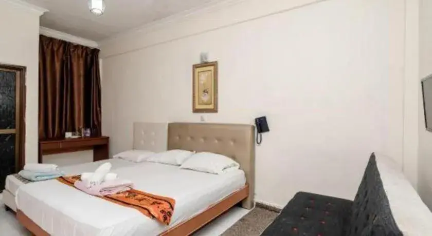 Bed in Lai Ming Hotel Cosmoland Bed in Lai Ming Hotel Cosmoland