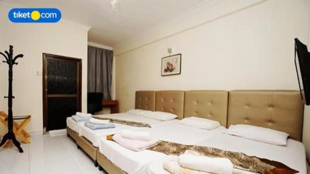 Bed in Lai Ming Hotel Cosmoland