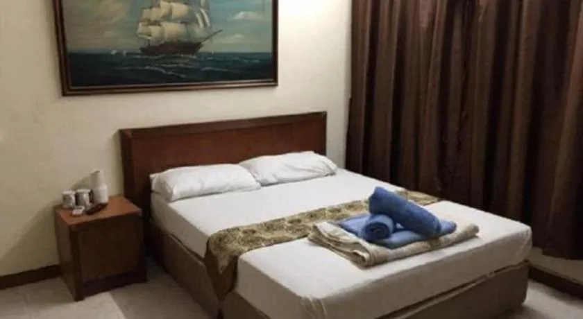 Bed in Lai Ming Hotel Cosmoland
