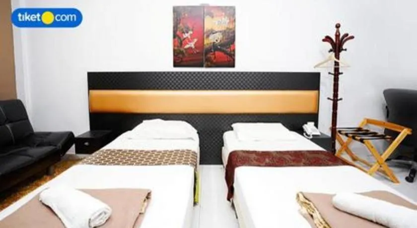 Bed in Lai Ming Hotel Cosmoland