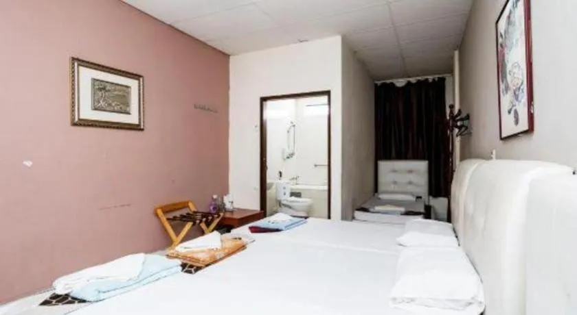 Bed in Lai Ming Hotel Cosmoland