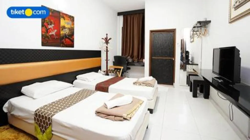 Bed in Lai Ming Hotel Cosmoland