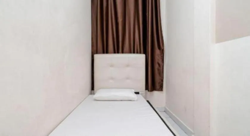 Bed in Lai Ming Hotel Cosmoland